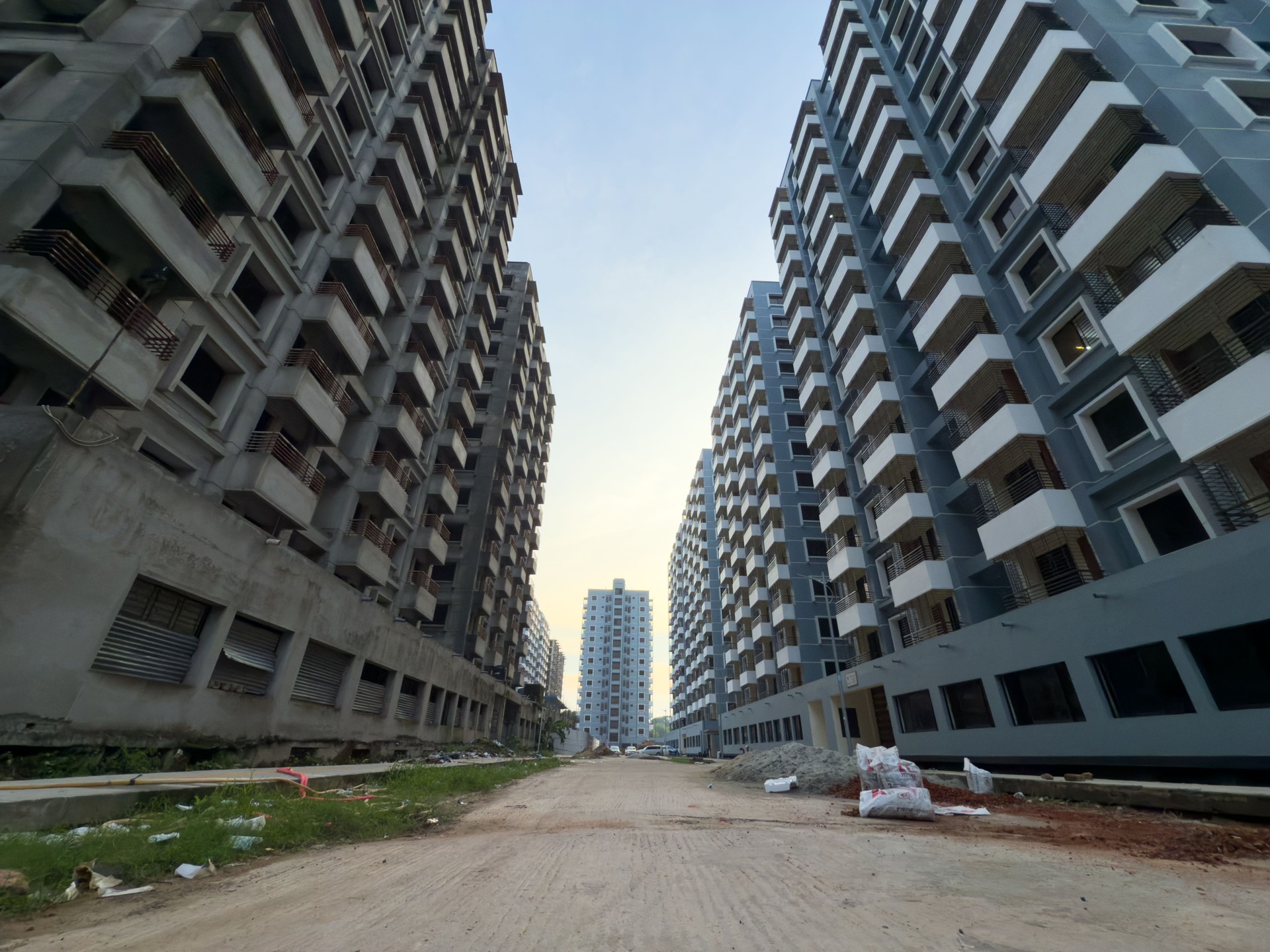 Large-Scale Urban Residential Development. Modern Apartment Complexes Under Construction and Finished in City Landscape